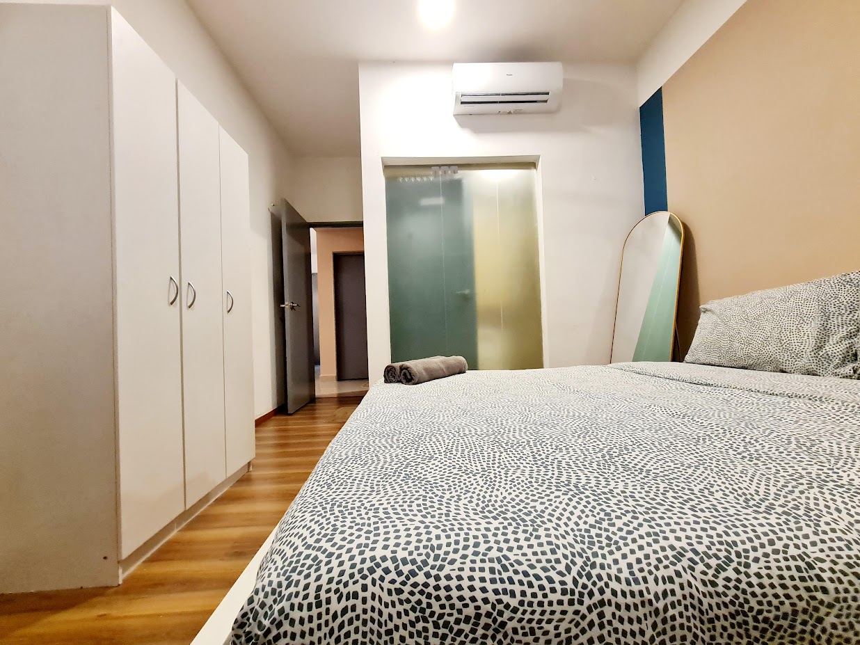 Bedroom detail with mirror and bed