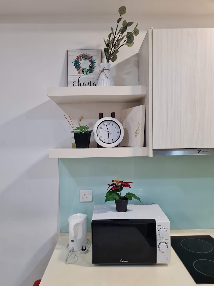 Living space and amenities inside the Cyberjaya homestay